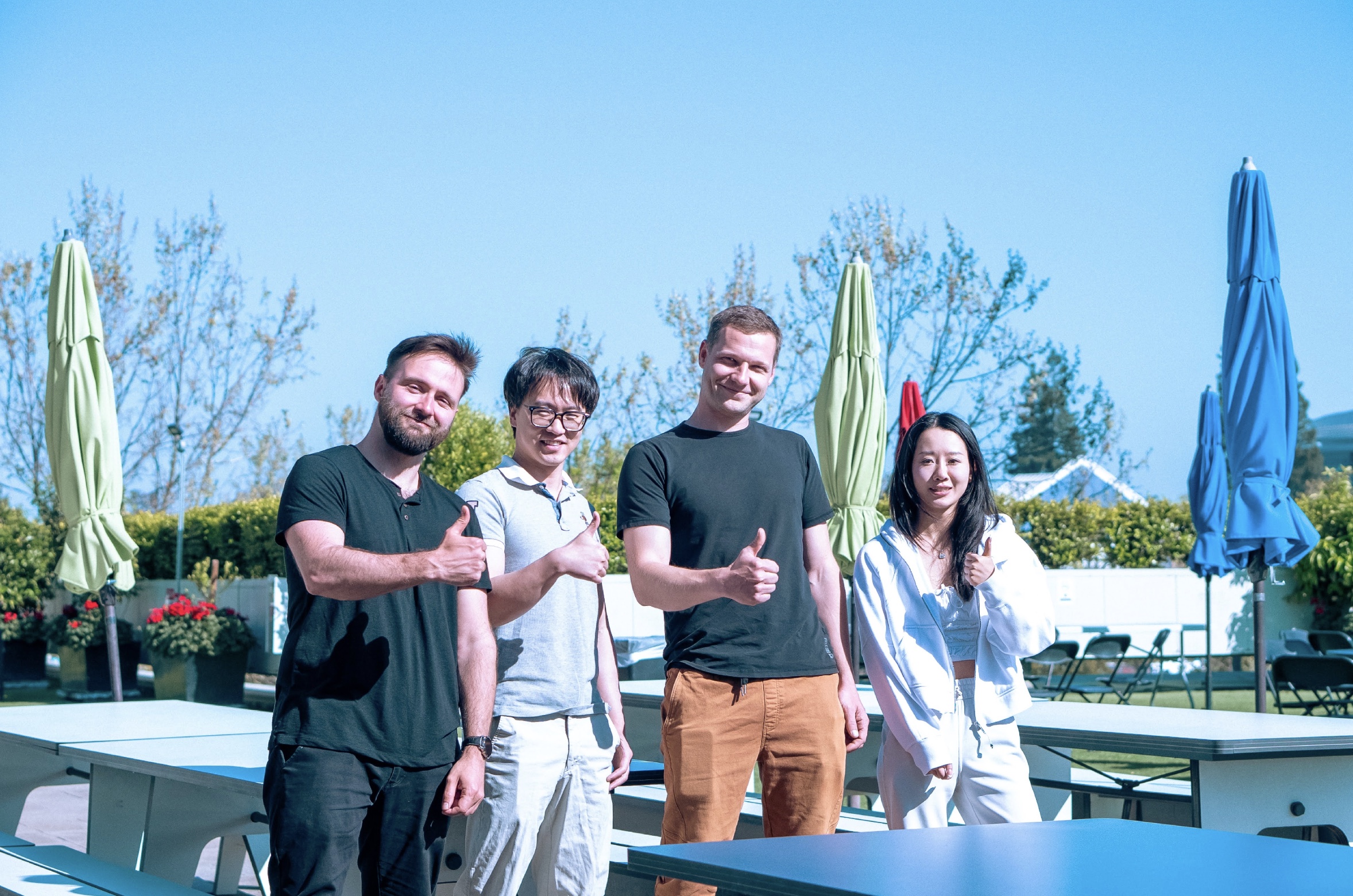 Mengmeng with her creative team outdoors